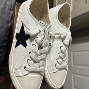 White Sneakers with Black Star Accent